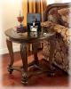 T499-6 Norcastle Round End Table By Ashley Signature  Design From Metro Furniture Show